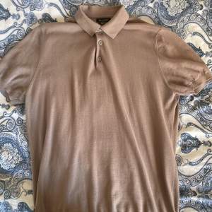 Stickad Massimo Dutti piké i M