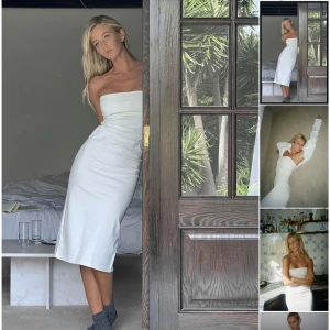 Bandeau klänning - Vit bandeau klänning med dragkedja bak. Från nakd Josefine HJs kollektion. Helt oanvänd. Nypris: 499 kr