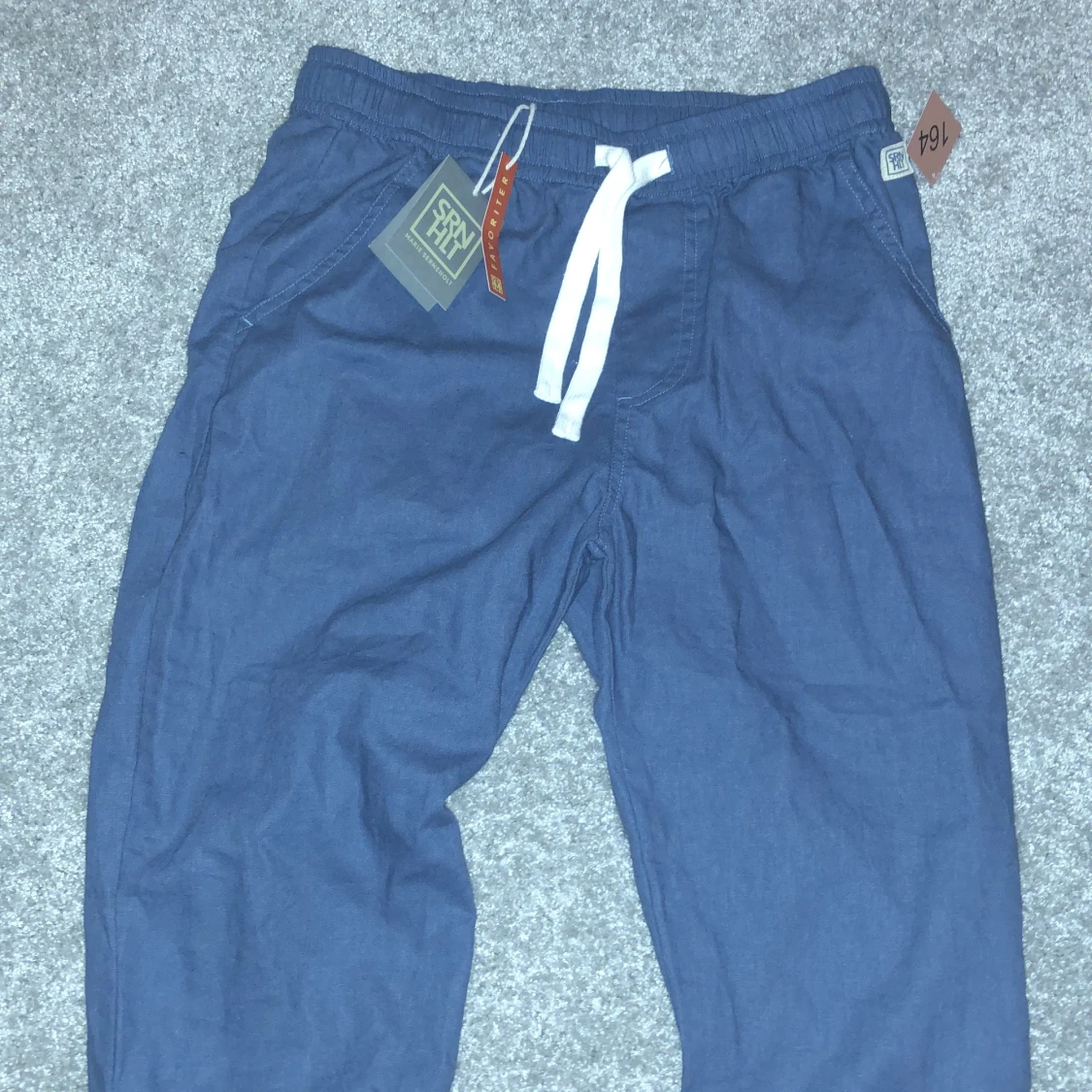 Säljér mina helt oanvända linne-byxor i marinblått