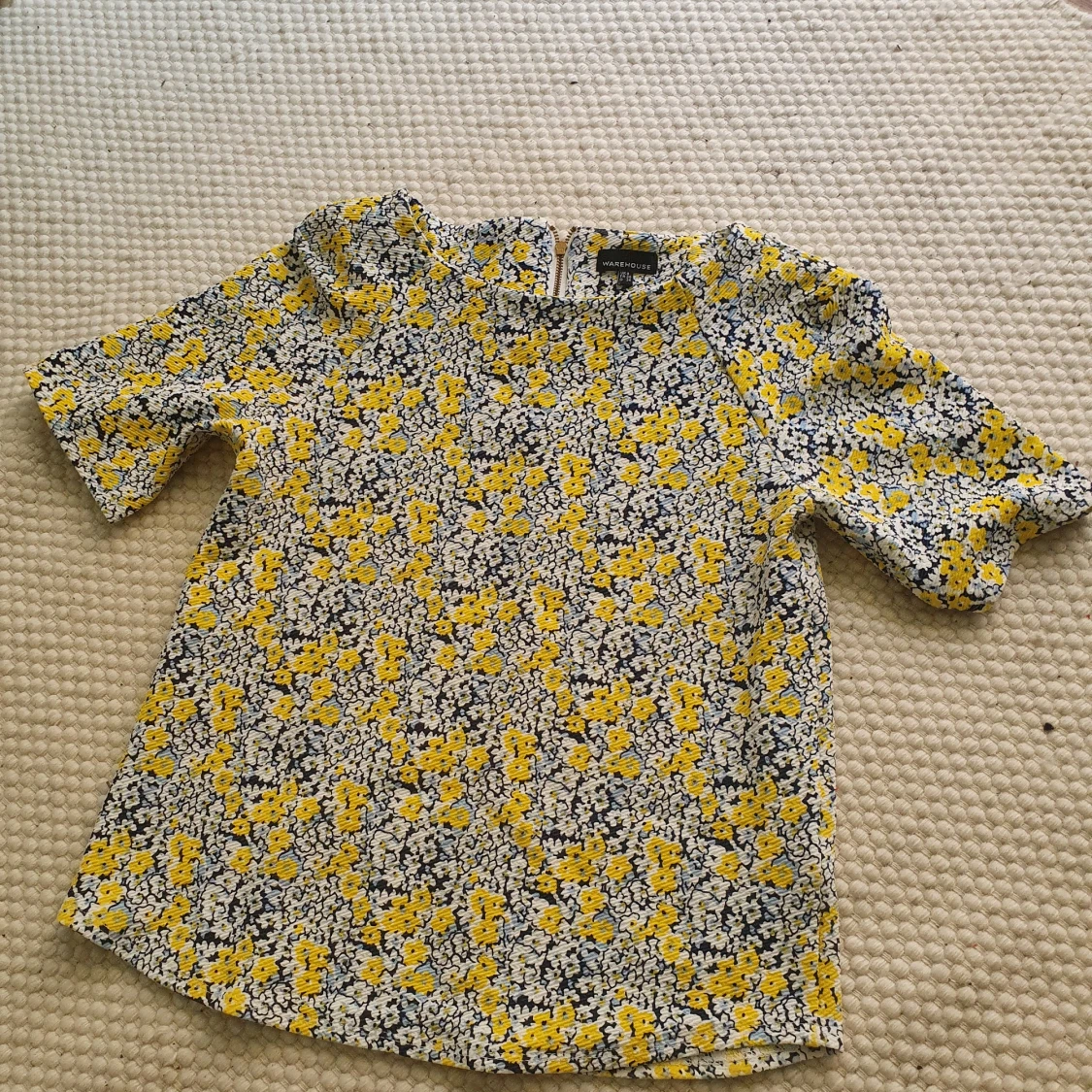 Blommig top från Warehouse 