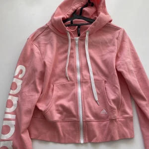 Zip hoodie - Rosa zip hoodie från adidas med dragkjedja och luva