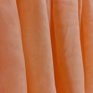 En peachfärgad kjol som funkar perfekt till kalas eller fest. Kan andvändas till både topp och till kjol. 