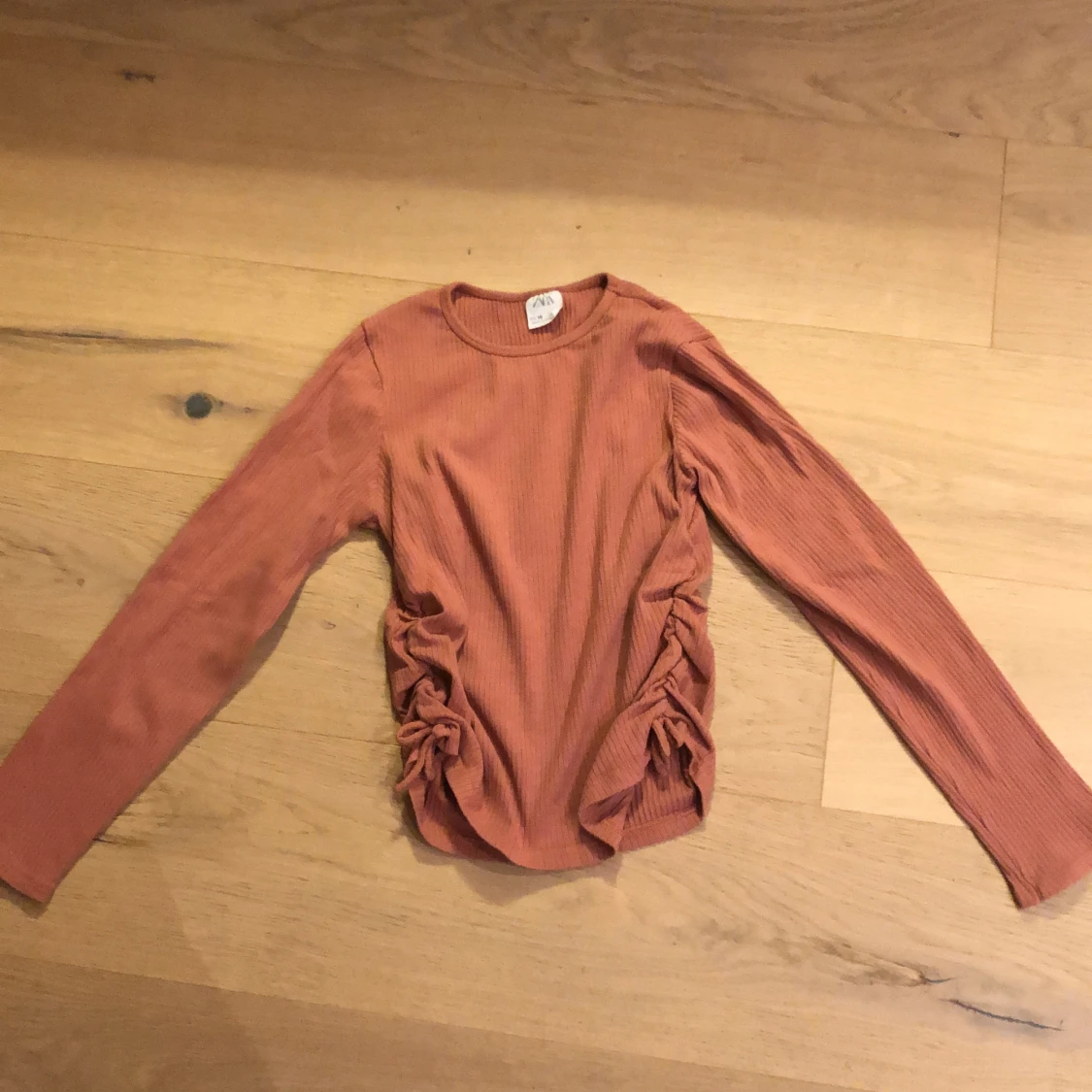 Rosa långärmad tröja storlek 10år