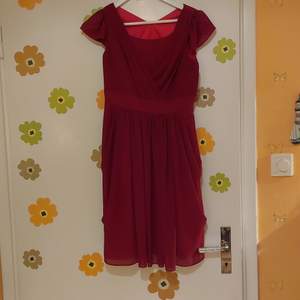 Dark pink midi dress from Japan. Very cute and looks a bit vintage style. Used once a few years ago. In excellent condition!