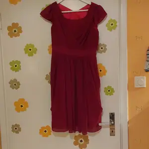Dark pink midi dress from Japan. Very cute and looks a bit vintage style. Used once a few years ago. In excellent condition!