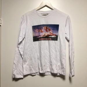 Långärmad t-shirt med tryck  - Långärmad t-shirt med tryck storlek xs 