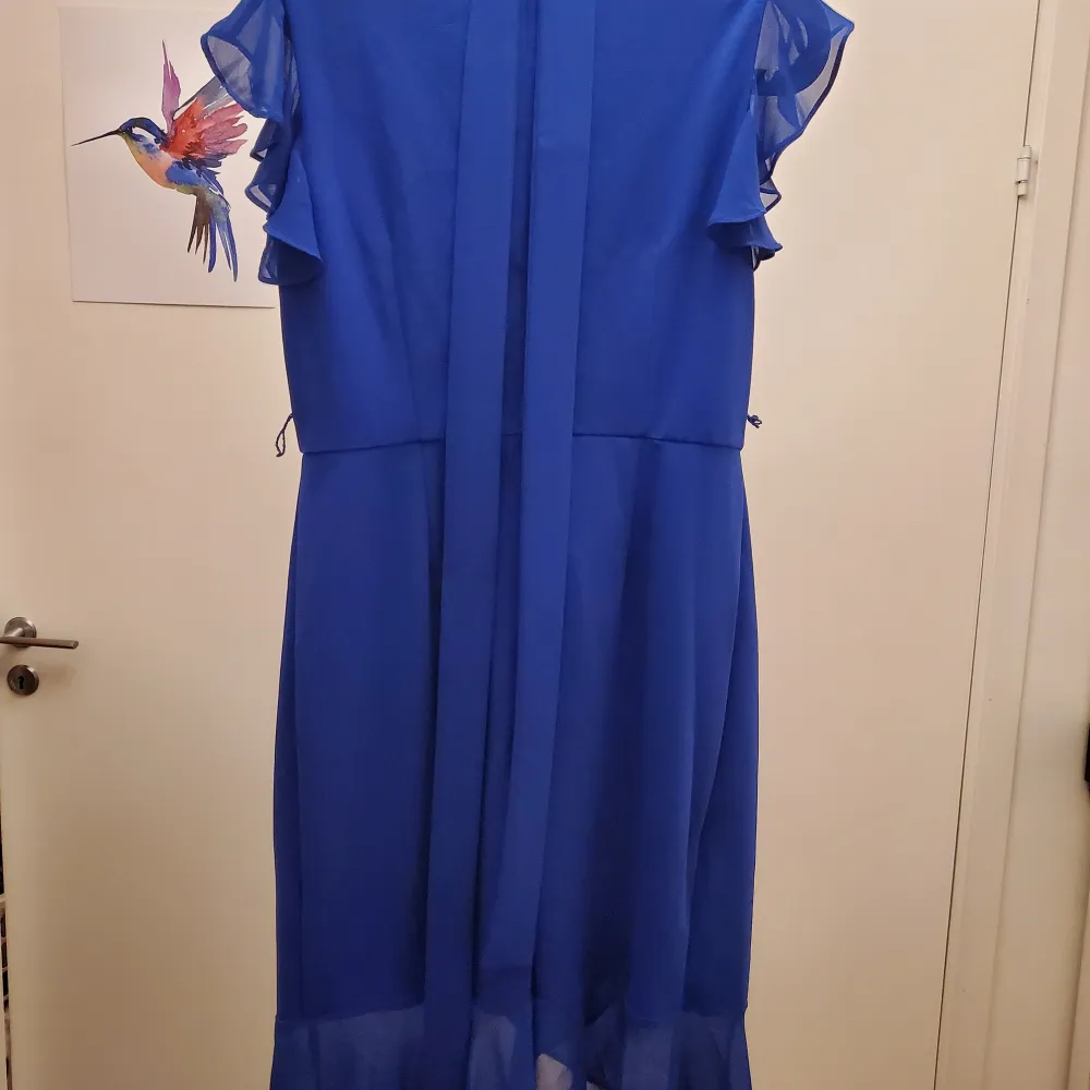 Blå klänning från USA. Klänningar.