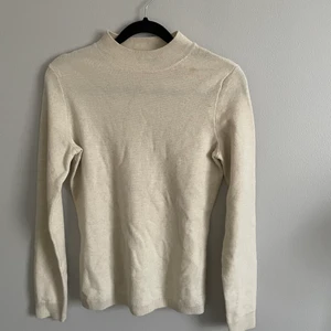 Finstickad tröja Tiger - Från Tiger, använd 1 gång. St xs. Fin beige färg. 