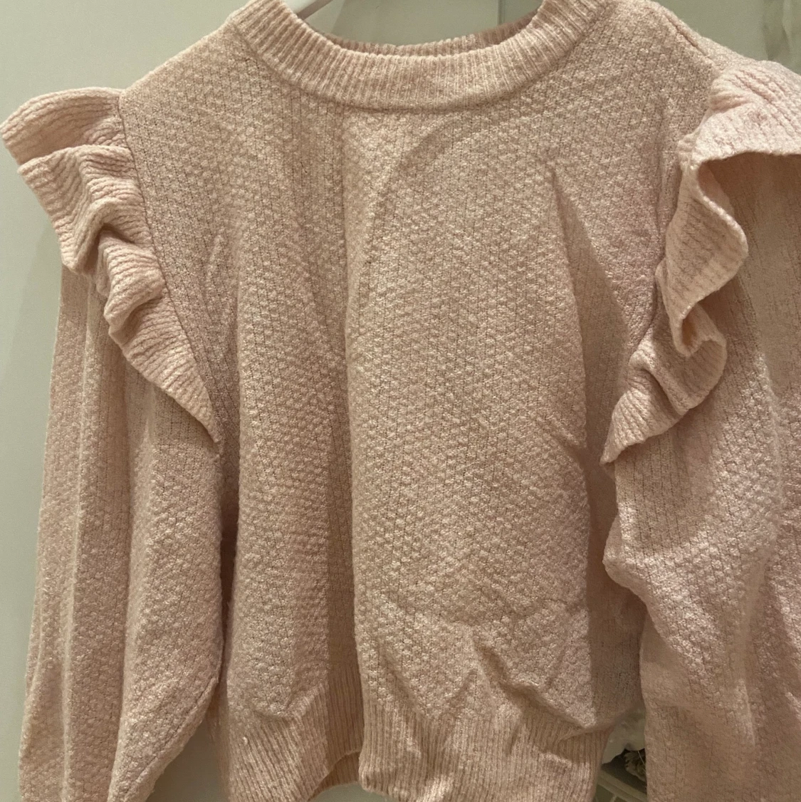 Stickad tröja