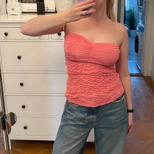 Rosa bandeau topp  - Rosa vintage bandeau topp! Storleken är xs men sitter mer som en S/ liten M. 