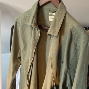 EAST WEST  - Nästintill helt ny i skicket, strl XL men sitter som en vanlig L tröja 