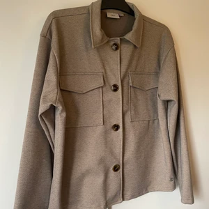 Kappa  - Oanvänd kappa 