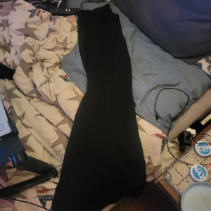 Rainbow  - Jazzbyxor stl 46/48. Svarta.  Stretch i dom