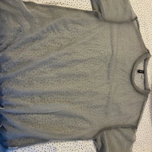 Genomskinligt glitter överplagg - Snyggt stort festligt överplagg. Passar på raves och konserter 