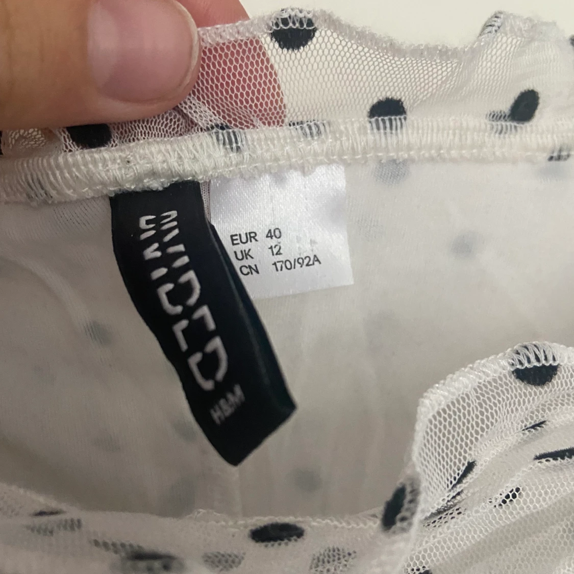 Prickig draperad topp - 91