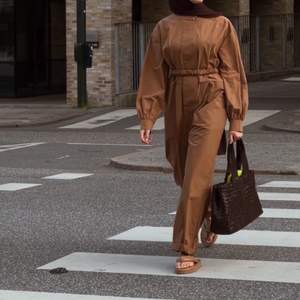 Brown Jumpsuit with belt, size Small. From Lovechild.
