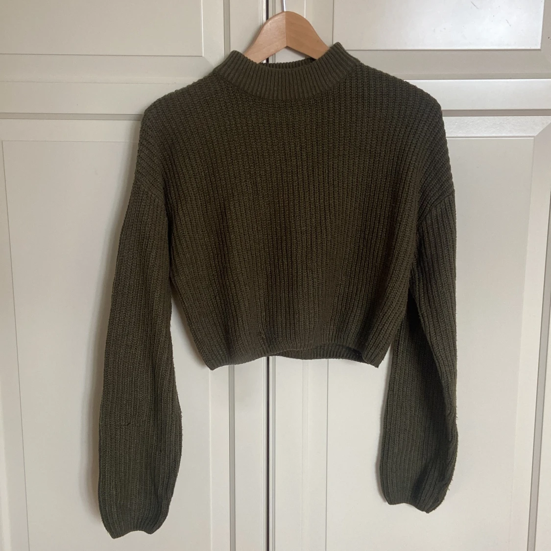 Stickad grön tröja