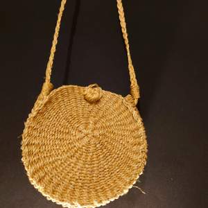 Hand crafted / woven from the Philippines, made from abaca ( a plant/ tree that looks like banana)  Best to wear with dress, but can also partner with shorts or pants. I forgot the size but can fit 10-12 inches size of phone+ wallet (size is estimated)