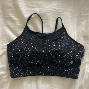 ATHELECIA SPORT-BH  - Aldrig använd sport-bh i stl.s. Jätte snygg print passar ihop med svarta tights. 