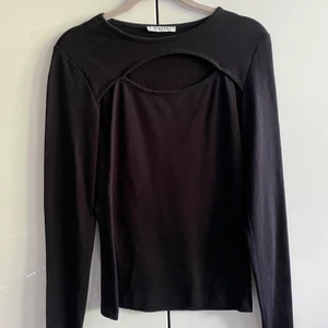 Svart topp - Beskrivning finns på bilden 