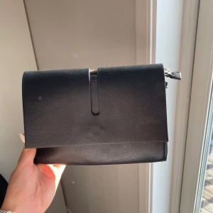 Carin Wester väska  - Aldrig använt, kuvert väska 