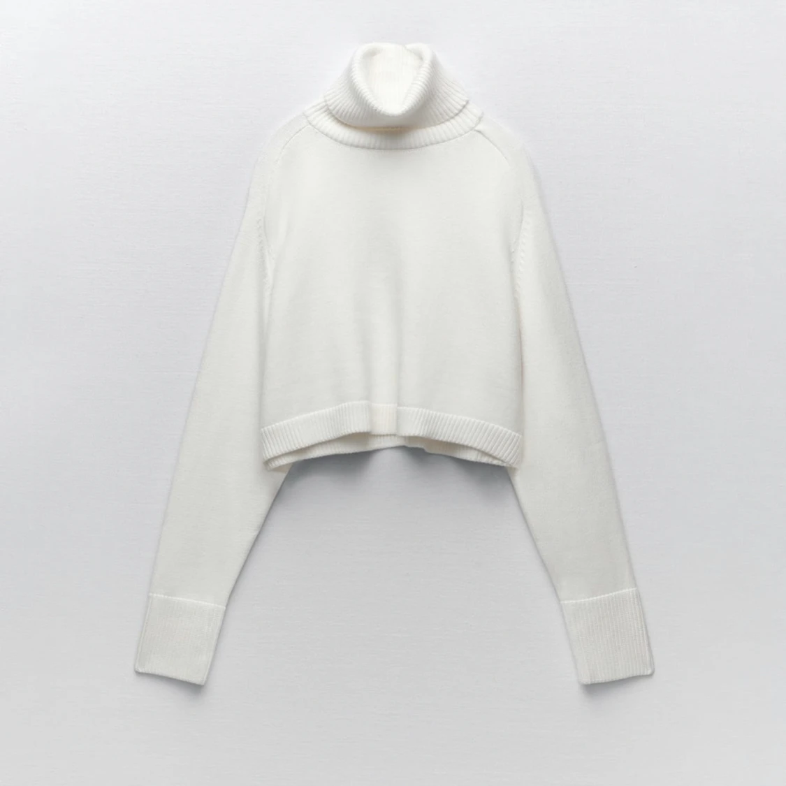 Croppad stickad tröja