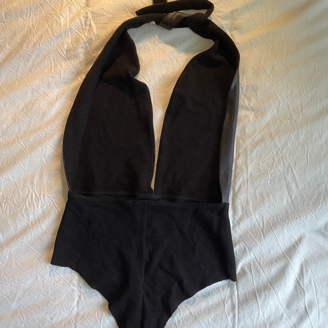 Subdued halter black leather top M - 90