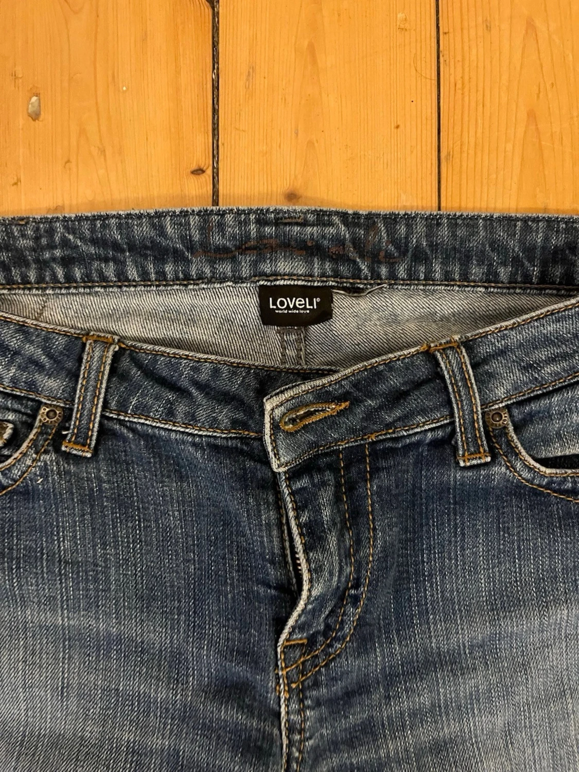 Mörkblå bootcut jeans med slitningar - 4