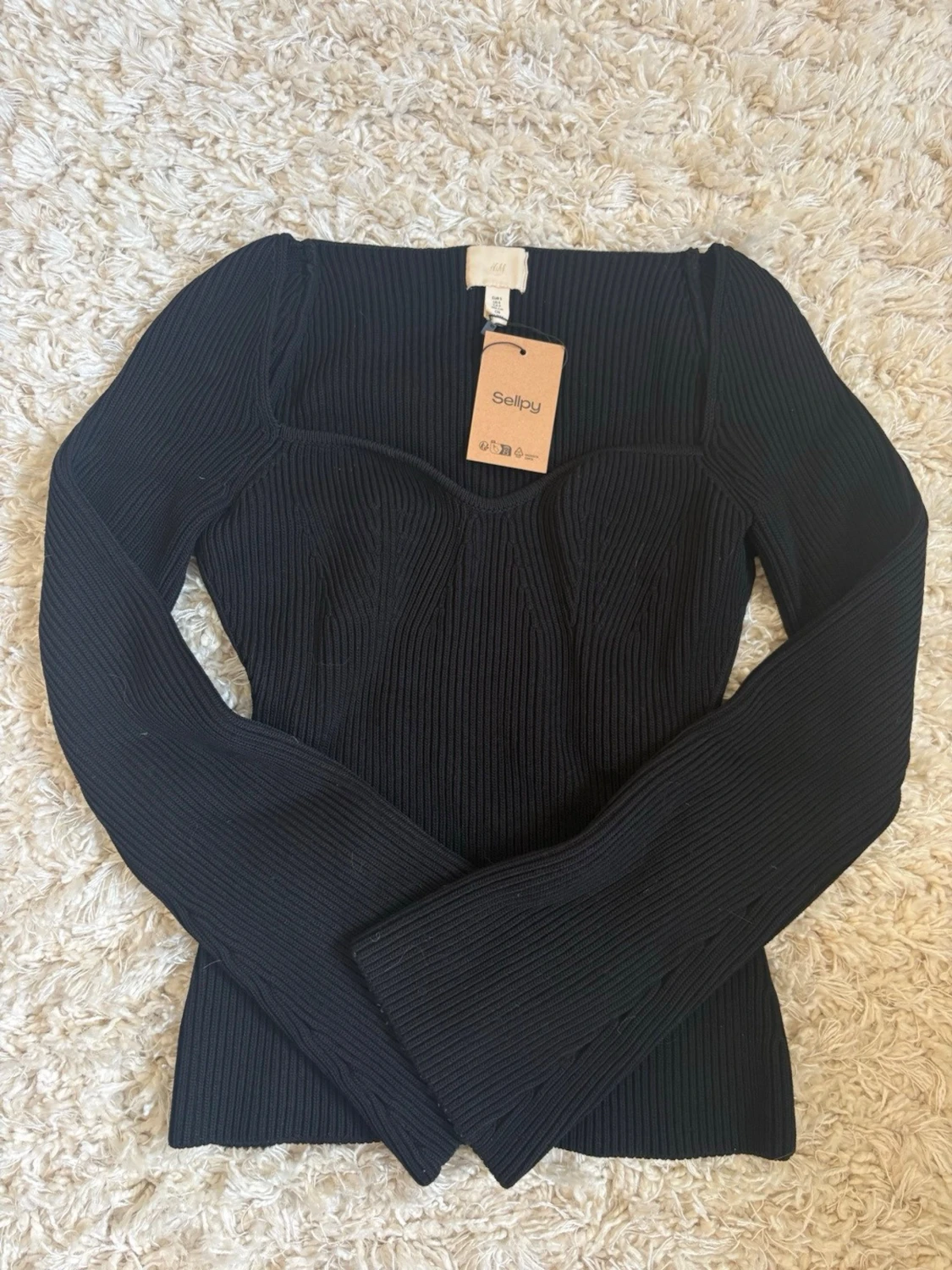 Svart ribbad topp från H&M