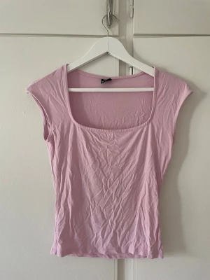 Rosa topp - I fint skick. Storlek S