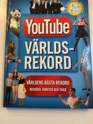 YouTube Världsrekord bok - 'YouTube Världsrekord' som samlar världens bästa rekord, bragder, konster och trick från YouTube. Boken är fylld med bilder, fakta och QR-koder till videoklipp.💗