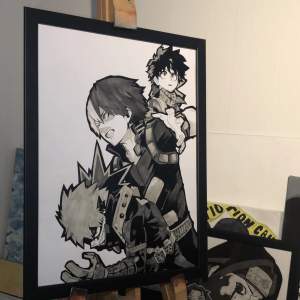 Drawing of the My Hero Academia characters Deku, todoroki ans baguko on thick paper with the size A3 paper put in black Ikea frame