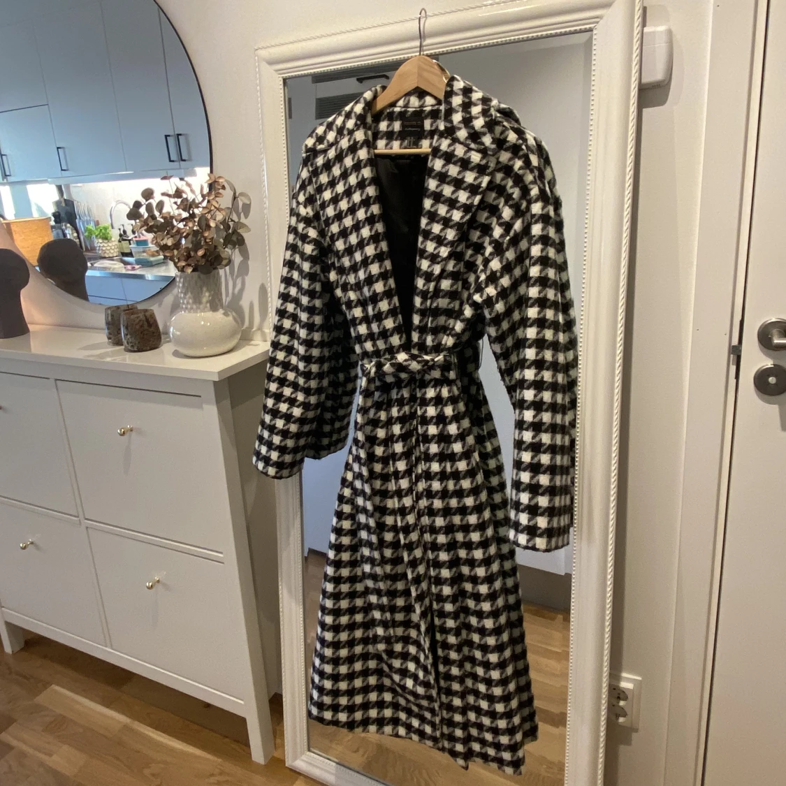 Hundtandsmönstrad kappa