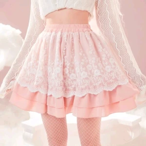 Rosa kjol med blommor - Storlek; MEDIUM/LARGE