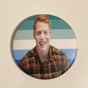 Mustiga mauri pin - En pin med mustiga mauri. Valfri flagga/bakgrund