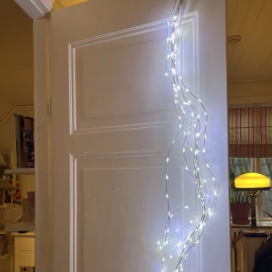 Ljusslinga  - Ljusslinga från rusta med sex rader som lyser, säljes för att det inte kommit till användning