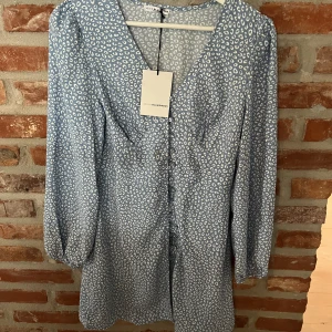 Klänning  - Helt oanvänd sommarklänning 