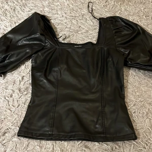 Topp - En jättefin topp från Gina Tricot i ett jättefint skick 