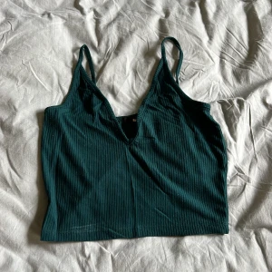 Smaragdgrön topp - Fint bagagnat skick