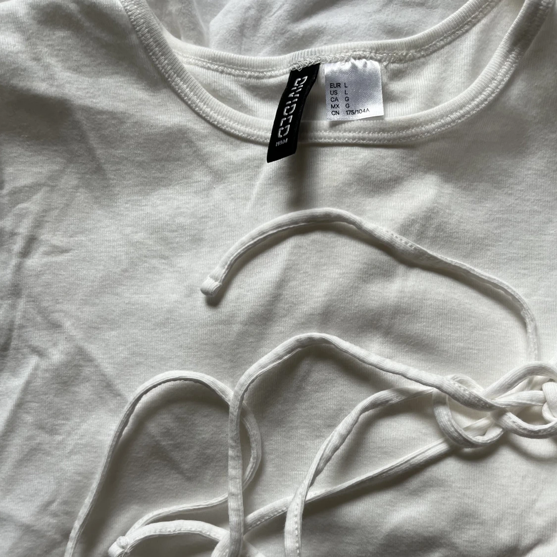 Vit top från hm med knyt - 91