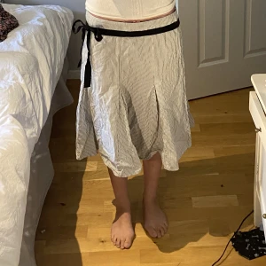 Kjol  - Passar s - L  Blå och vitrandig 