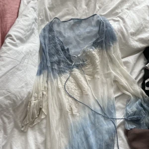 Strand klänning - Strandklänning aldrig använt.