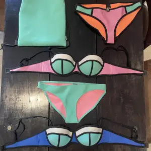 3 bikini bottoms size small and medium, 2 bikini tops size large from Triangl. Bag follows. 