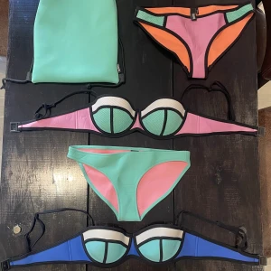2 bikini sets from Triangl - 3 bikini bottoms size small and medium, 2 bikini tops size large from Triangl. Bag follows. 