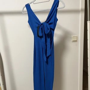 Klänning  - Storlek 34