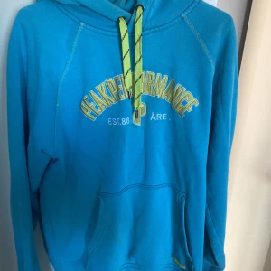 Peak performance huvtröja - Storlek M