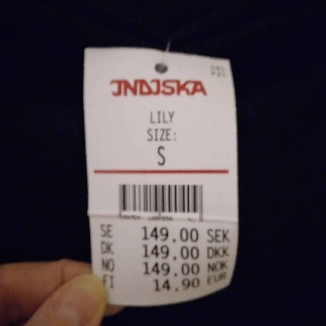 Kort svart kjol med fickor, från Indiska. Strlk 36, Small. Mjuk  bomullsjersey. Helt NY & OANVÄND. Felfri. - 1