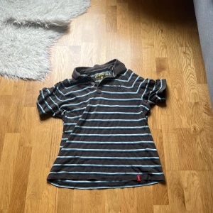 Piké - Absolut ingen aning på vad det är för märke Lite använd, den har hål men det märks inte