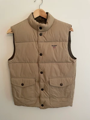 Dunväst Gant - Nyskick Beigebrun/mörkgrön Vändbar