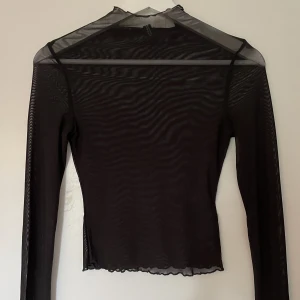 Mesh topp - En mesh topp från H&M, knappt använd, fint skick! Storlek xs